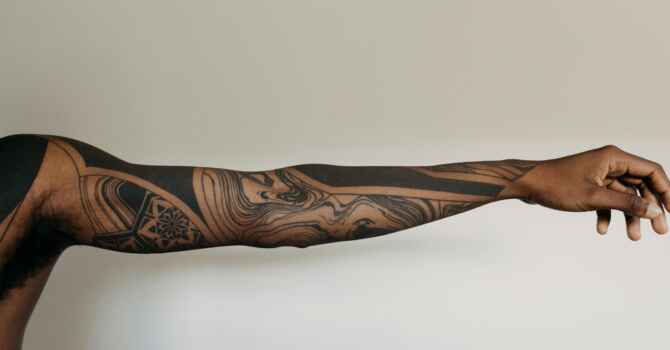 black and brown tribal tattoo